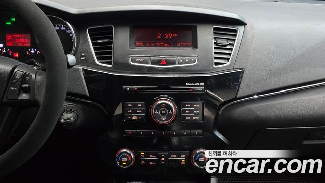 Kia K7 2011 — photo 26