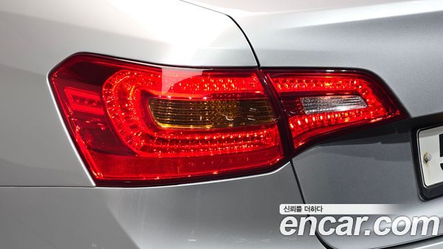 Kia K7 2011 — photo 9