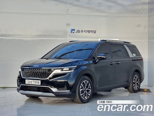 Kia Canival 2023 — photo 1