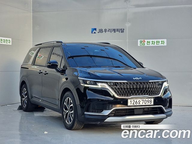 Kia Canival 2023 — photo 2