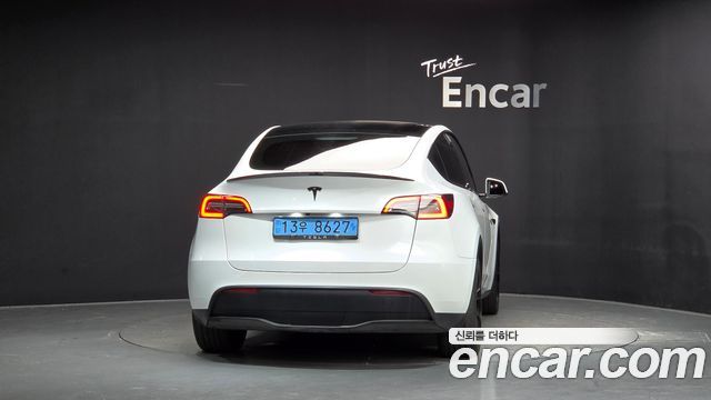 Tesla Model Y 2023 — photo 4