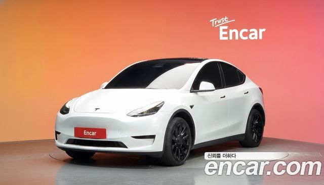 Tesla Model Y 2023 — photo 1