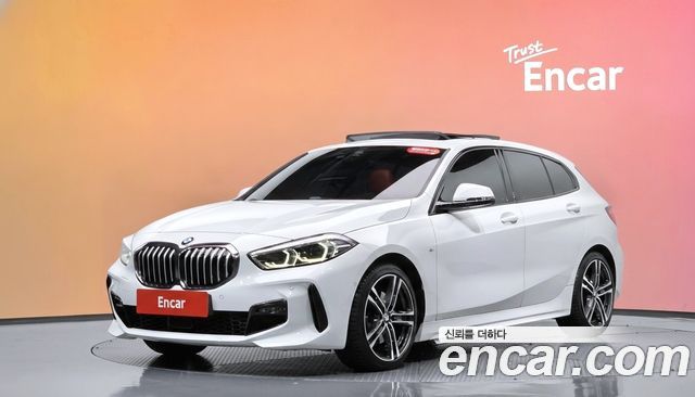 BMW 1-Series 2021 — photo 1