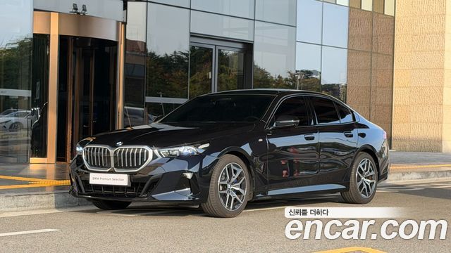 BMW 5-Series 2024 — photo 1