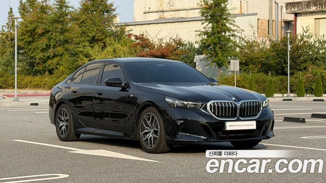BMW 5-Series 2024 — photo 11