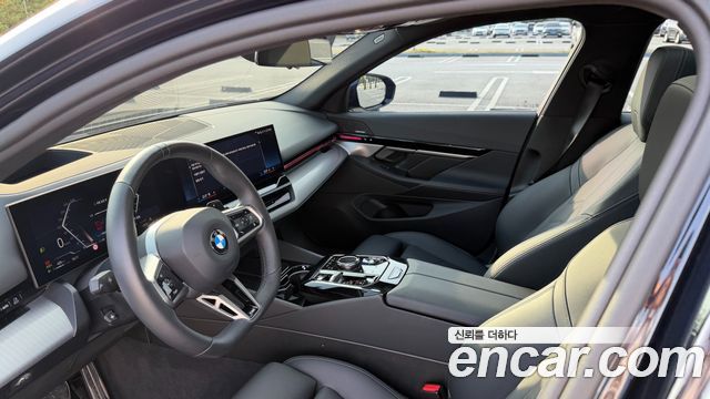 BMW 5-Series 2024 — photo 16