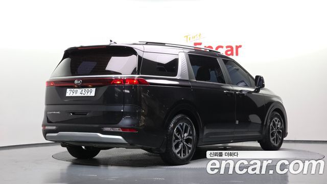 Kia Canival 2021 — photo 2