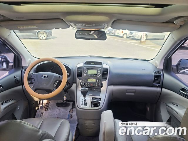 Kia Canival 2012 — photo 2