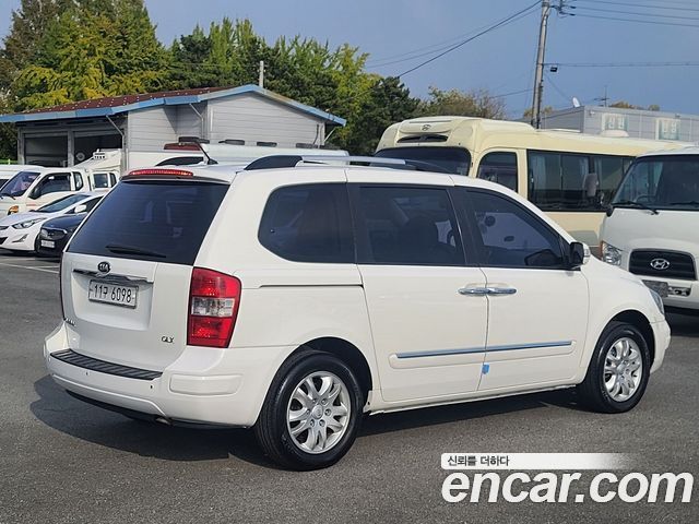 Kia Canival 2012 — photo 7
