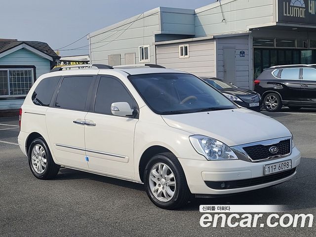 Kia Canival 2012 — photo 8