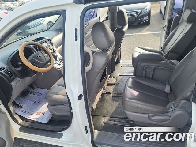 Kia Canival 2012 — photo 10