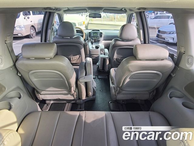 Kia Canival 2012 — photo 12