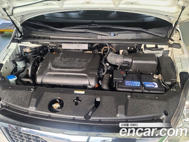 Kia Canival 2012 — photo 19