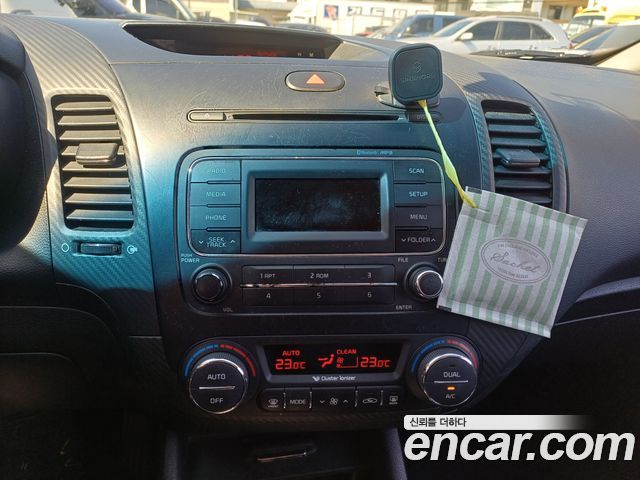 Kia K3 2013 — photo 10