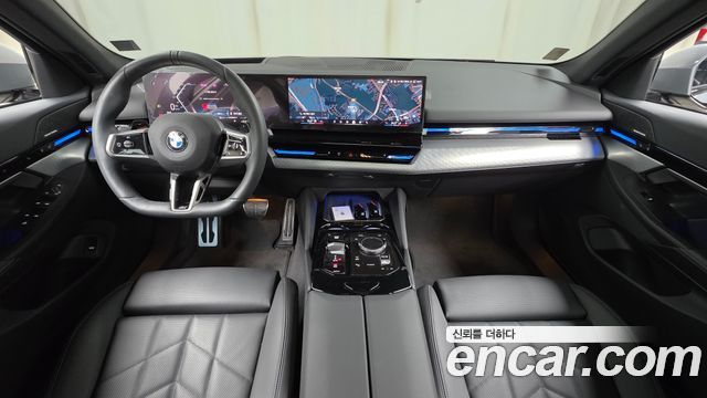 BMW 5-Series 2024 — photo 10