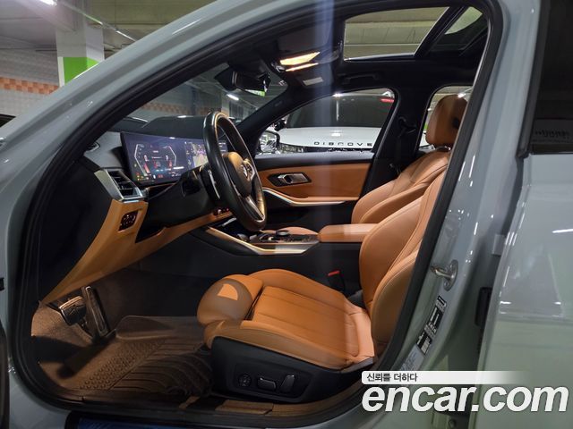 BMW 3-Series 2024 — photo 10