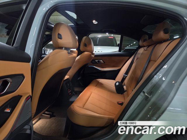 BMW 3-Series 2024 — photo 11