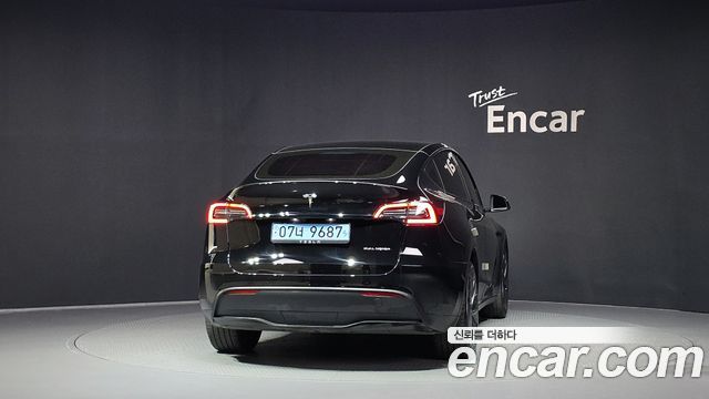 Tesla Model Y 2024 — photo 4
