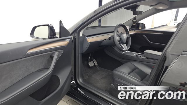 Tesla Model Y 2024 — photo 13