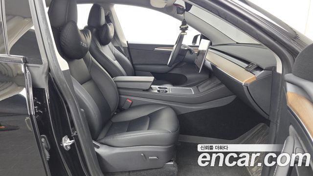 Tesla Model Y 2024 — photo 17