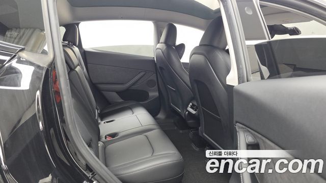 Tesla Model Y 2024 — photo 18