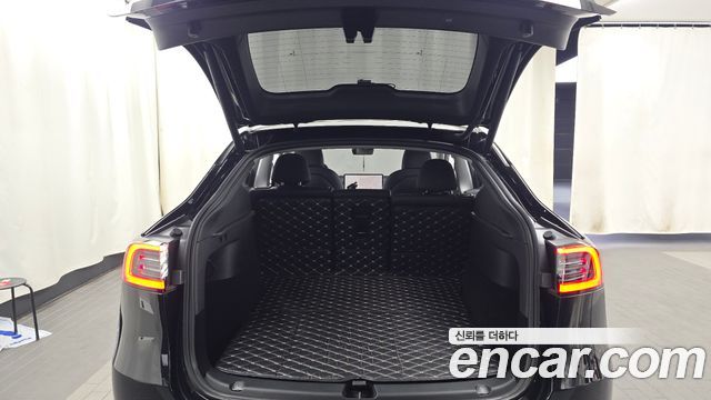 Tesla Model Y 2024 — photo 26