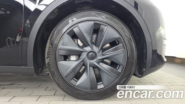 Tesla Model Y 2024 — photo 7