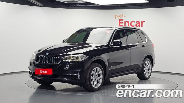 BMW X5 2015 — photo 1