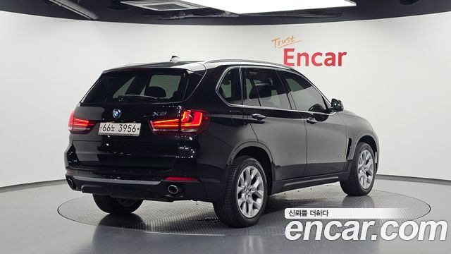 BMW X5 2015 — photo 2