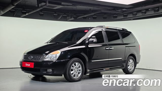 Kia Canival 2012 — photo 1