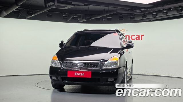 Kia Canival 2012 — photo 3