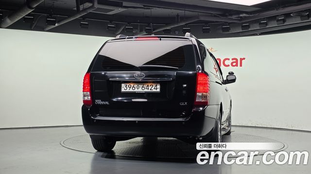 Kia Canival 2012 — photo 4