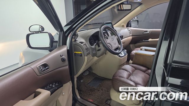 Kia Canival 2012 — photo 10