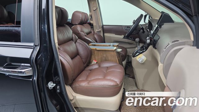 Kia Canival 2012 — photo 11