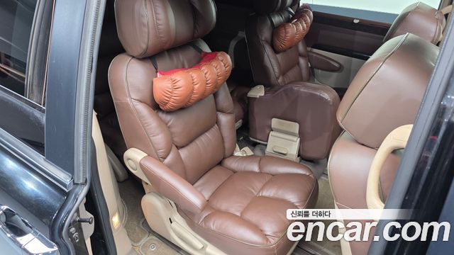 Kia Canival 2012 — photo 12