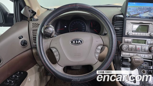 Kia Canival 2012 — photo 13