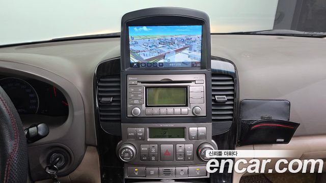 Kia Canival 2012 — photo 14