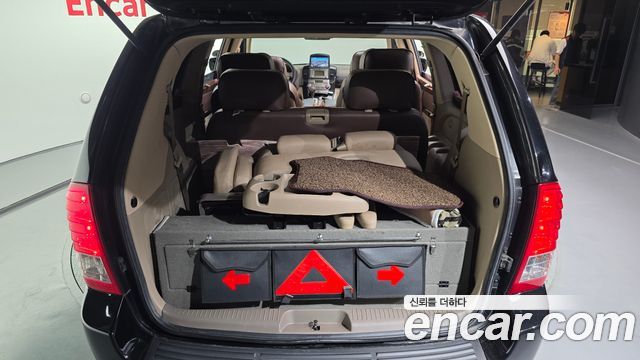 Kia Canival 2012 — photo 20