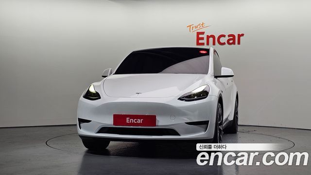 Tesla Model Y 2024 — photo 3