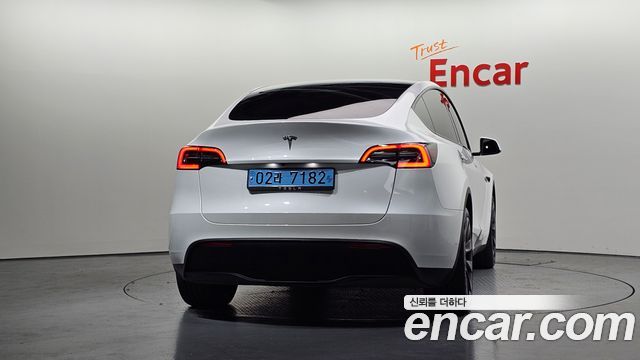 Tesla Model Y 2024 — photo 4
