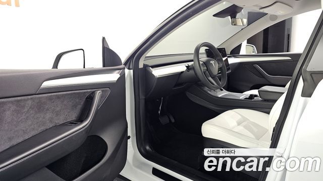 Tesla Model Y 2024 — photo 11