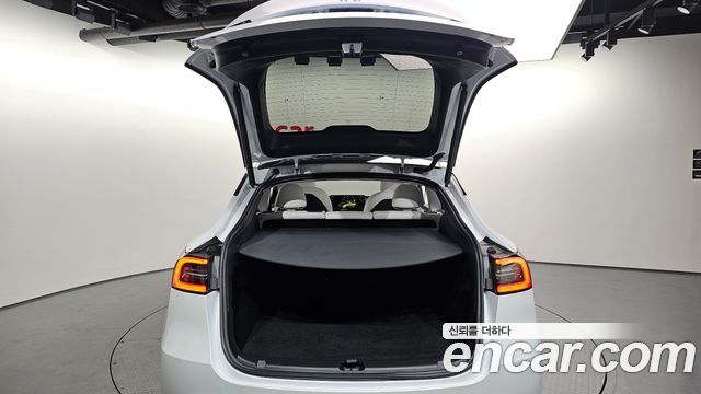 Tesla Model Y 2024 — photo 20