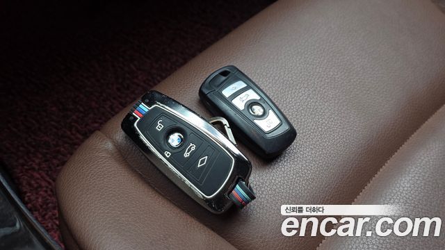 BMW 5-Series 2013 — photo 28