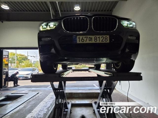 BMW X3 2021 — photo 1