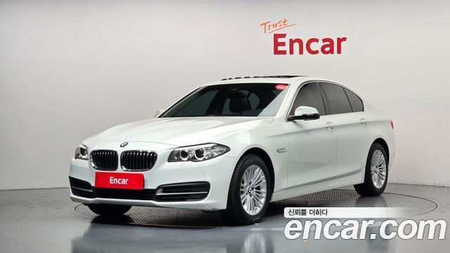 BMW 5-Series 2015 — photo 1