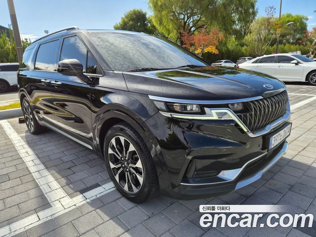 Kia Canival 2021 — photo 2