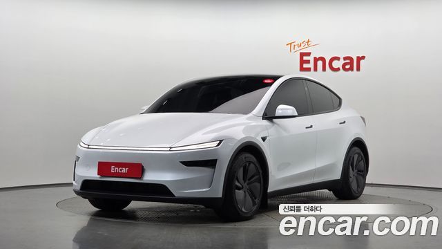 Tesla Model Y 2025 — photo 1