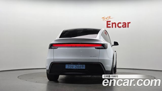 Tesla Model Y 2025 — photo 4