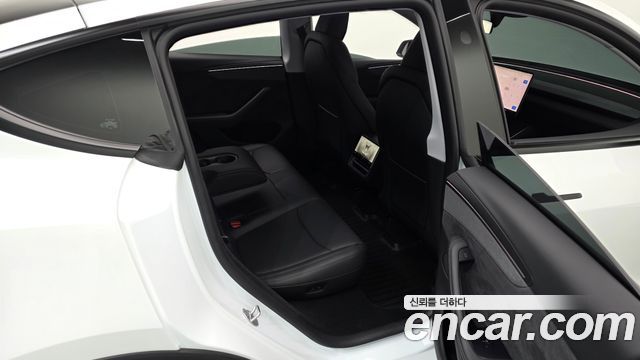 Tesla Model Y 2025 — photo 18