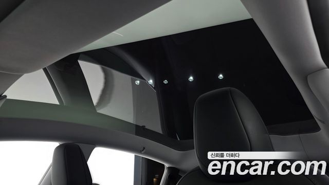 Tesla Model Y 2025 — photo 25